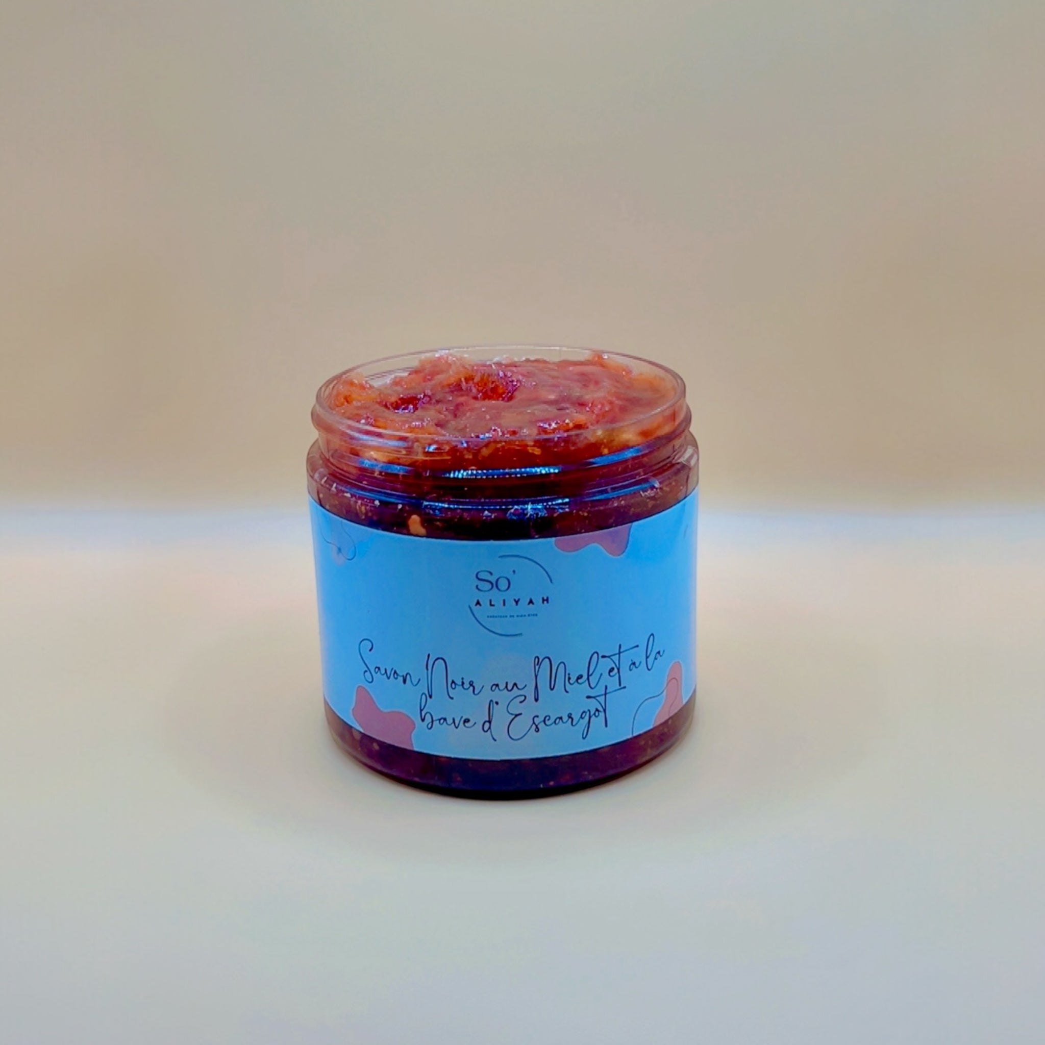 Savon noir au miel, bave d'escargot et cauris