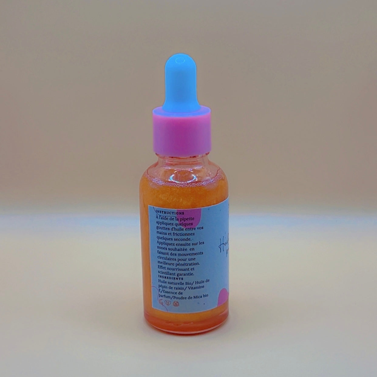 Huile pailletée parfumée