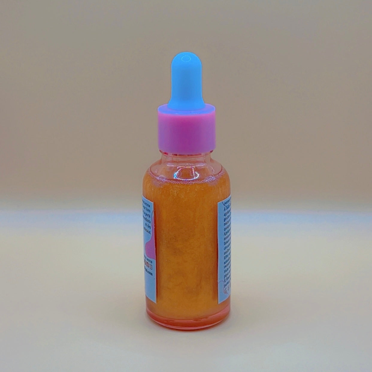 Huile pailletée parfumée