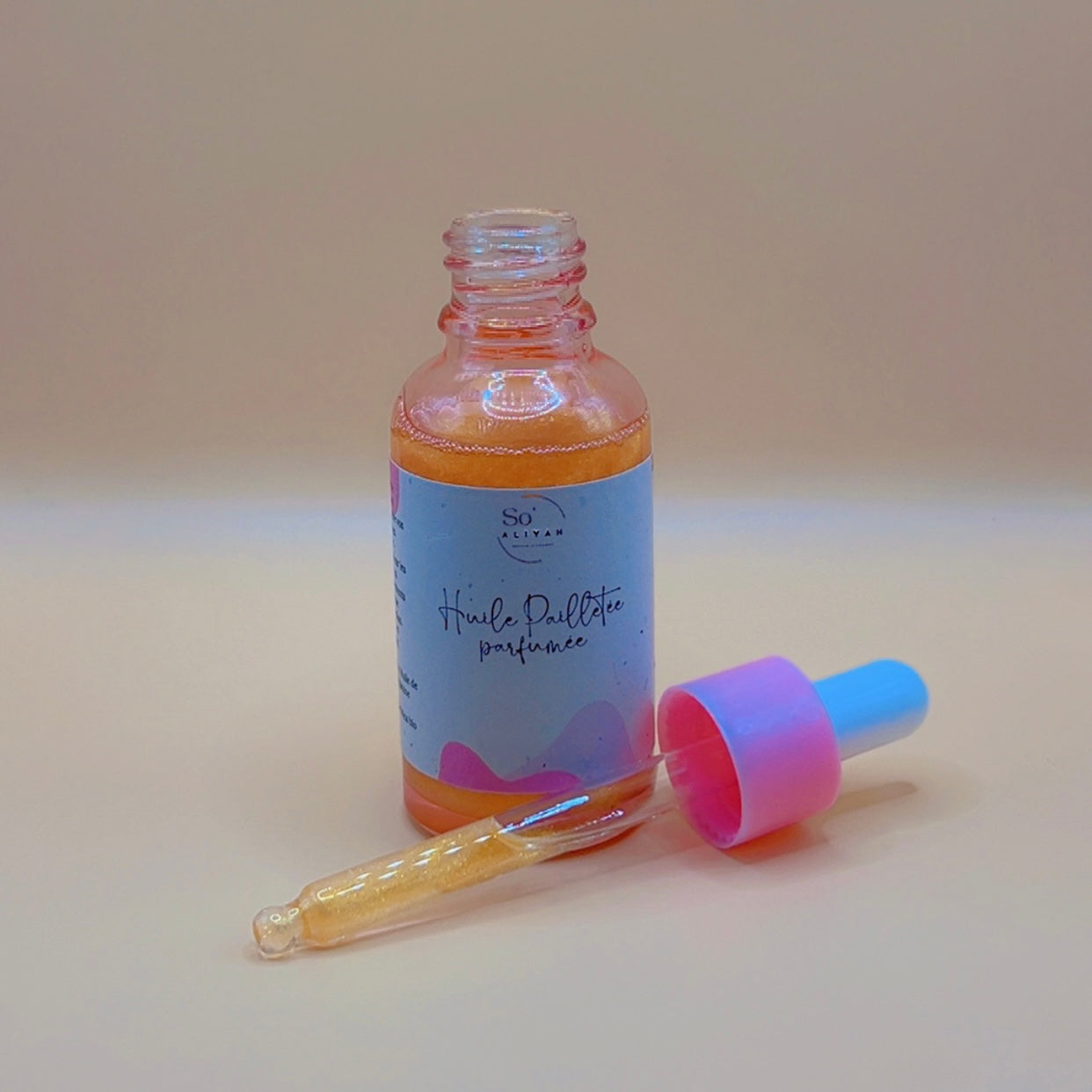 Huile pailletée parfumée