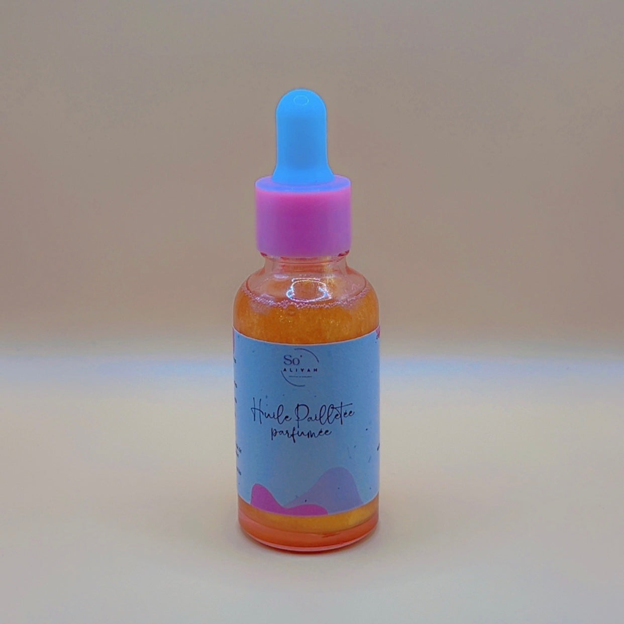 Huile pailletée parfumée